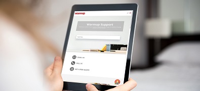 A person using the Warmup website on their tablet